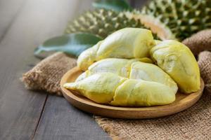 Long Laplae Durian on  wood plate,It is the most expensive and most delicious of all durians. photo