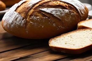 rebanado de masa fermentada un pan a el mesa. foto