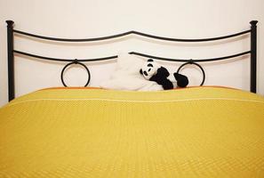 panda en cama foto