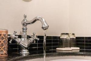 Luxury vintage faucet in the bathroom photo