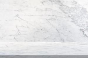 white marble table with natural wall texture background for mockup product display template photo