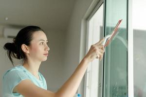 Beautiful woman cleaning house. photo