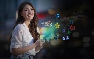 Woman using mobile smart phone with global network connection concept photo