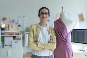 fashion designer woman Happy to design clothes. photo