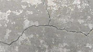 Cracked texture concrete floor cement wall broken at the outside effect with earthquake video