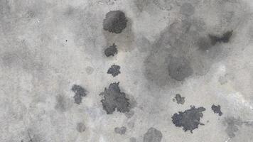 Stains of engine oil from cars that drip onto the cement floor video