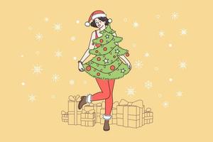 Preparation for Christmas and New Year holidays concept. Smiling happy girl standing and wearing Christmas tree with decorations as dress and Santa hat over holiday presents vector illustration