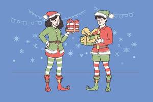 Smiling Santa helpers in festive costumes holding presents congratulate children on Christmas eve. Happy girl and boy elves with gifts greeting with New Year. Winter holiday. Vector illustration.