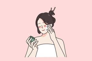 Beauty skincare and treatment concept. Young smiling woman with eyes closed standing applying cream on face cheeks taking care of skin vector illustration