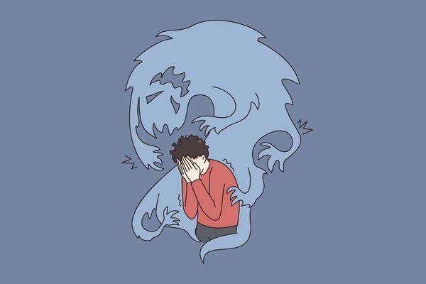 Inner fears and danger concept. Frustrated stressed boy standing covering face with hands and feeling afraid of ghost flying around vector illustration