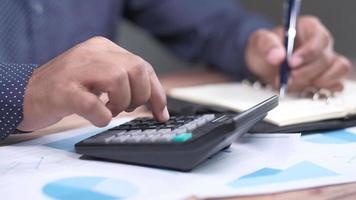 Close up of man hand using calculator video