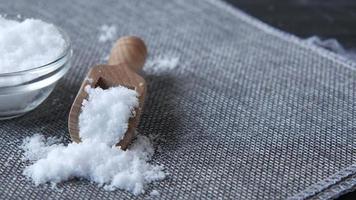 Coarse salt in a bowl on table video