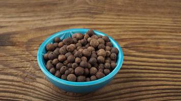 Allspice spice in a small bowl on the table video