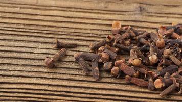Close-up of cloves on the wooden table. video