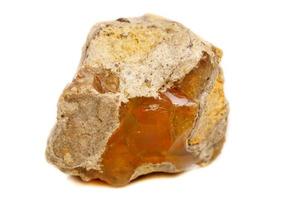 Macro Opal mineral stone in rock on white background photo