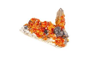 macro mineral stone Spessartine, orange, red garnet with quartz on white background