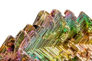 Macro of the mineral bismuth stone on a white background photo