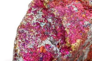 Macro mineral stone Chalcopyrite in the rock on a white background photo