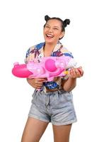 Portrait smiley woman in Songkran festival with water gun photo