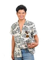 Portrait young man with water bowl in Songkran Festival photo