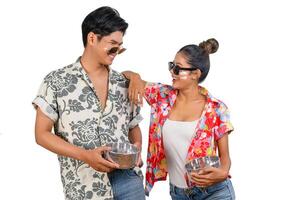 Portrait Young couple enjoy with water bowl on Songkran festival photo