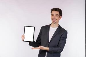 Portrait of attractive cheerful businessman using device app searching web isolated over white color background photo