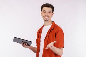 Portrait of attractive cheerful man using device app searching web isolated over white color background photo