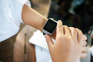 hand with smartwatch photo