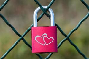 Love padlocks on a bridge. Valentines day love concept. photo