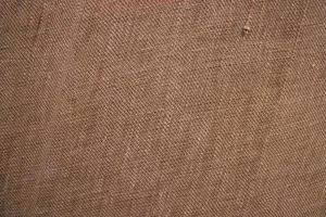 Brown Jute linen sackcloth Pattern texture can be used as background wallpaper photo