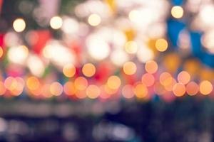 Party bokeh at night market festival,abstract blur image background photo