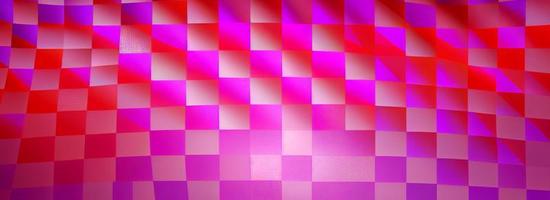 Abstract background consisting of geometric pattern. Gradient color from violet to red. Wide angle format banner photo