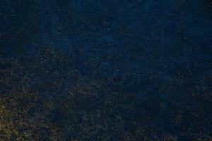 Solid navy blue concrete textured wall photo