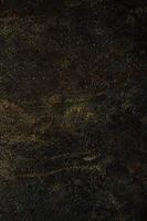 Black and golden marble textured background photo