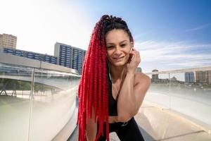 Fitness, portrait of a woman outside for a workout and training for healthy lifestyle and body wellness. Face of sports female or athlete, energy and power photo