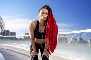 Fitness, portrait of a woman outside for a workout and training for healthy lifestyle and body wellness. Face of sports female or athlete, energy and power photo