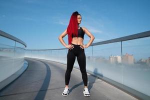 Fitness, portrait of a woman outside for a workout and training for healthy lifestyle and body wellness. Face of sports female or athlete, energy and power photo