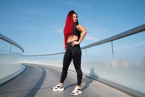 Fitness, portrait of a woman outside for a workout and training for healthy lifestyle and body wellness. Face of sports female or athlete, energy and power photo