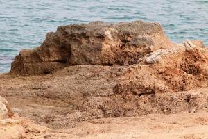 Rocky shore of the Mediterranean Sea in northern Israel. photo