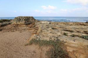 Rocky shore of the Mediterranean Sea in northern Israel. photo