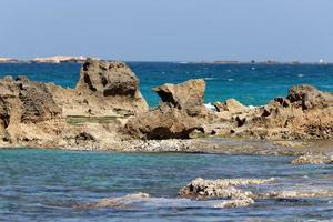 Rocky shore of the Mediterranean Sea in northern Israel. photo