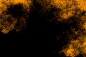 textura de acuarela naranja sobre fondo negro foto