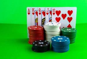 Poker chips and royal flush. photo