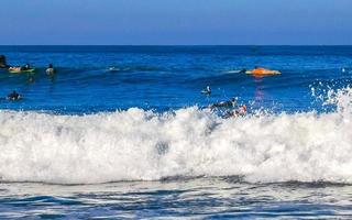 Puerto Escondido Oaxaca Mexico 2023 Surfer surfing on surfboard on high waves in Puerto Escondido Mexico. photo