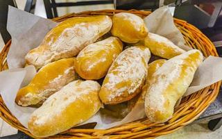 Rolls baguettes cakes and other pastries in Chedraui Supermarket Mexico. photo