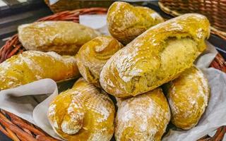 Rolls baguettes cakes and other pastries in Chedraui Supermarket Mexico. photo