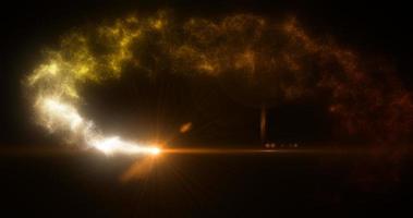 Abstract yellow glowing energy magic particle comet flying along path line futuristic hi-tech background photo