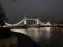 Tower Bridge in London at night photo