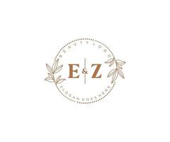 initial EZ letters Beautiful floral feminine editable premade monoline logo suitable for spa salon skin hair beauty boutique and cosmetic company. vector