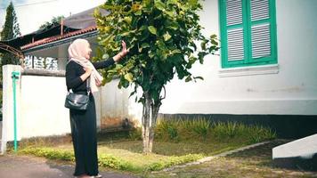 a group of Muslim women was very happy when they met their old friends when they were in front of the terrace of the house video